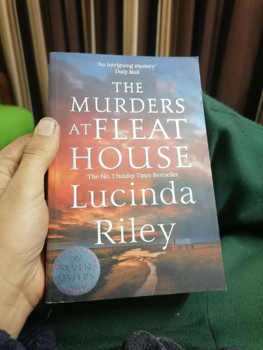 The Murders at Fleat House" by Lucinda Riley, a No. 1 Sunday Times Bestseller.