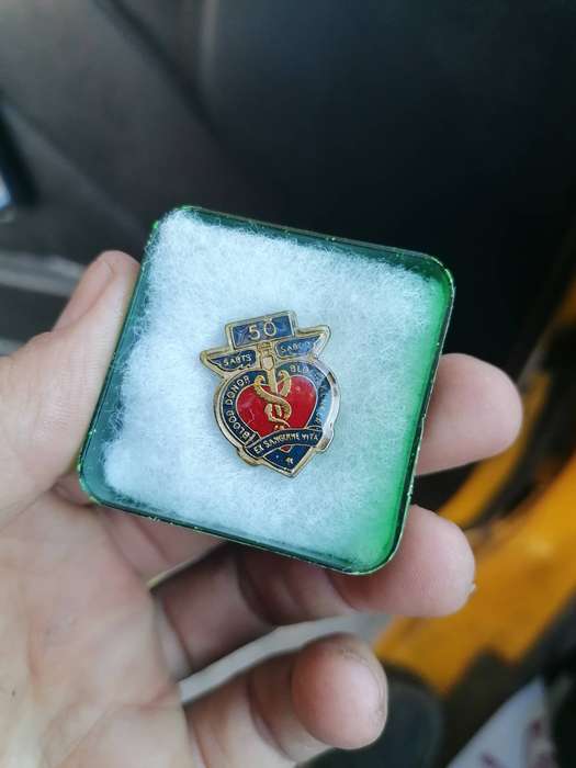 SABTS) blood donor lapel pin badge, specifically indicating 50 donations.