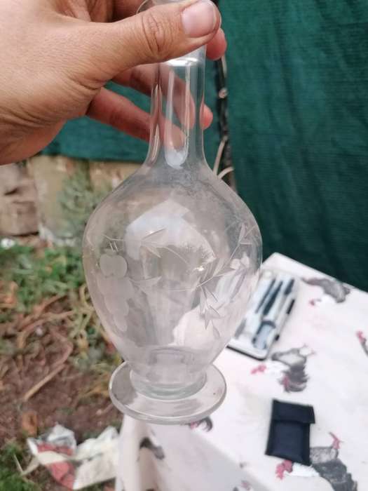 vintage etched glass decanter with a stopper,