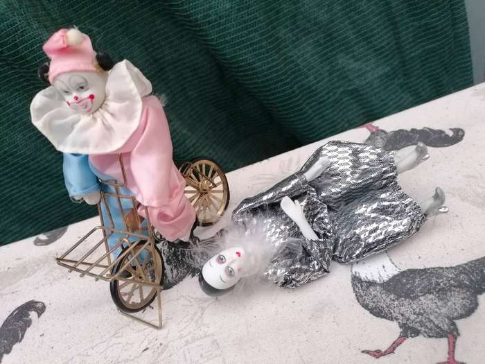 Pair porcelain clown figures