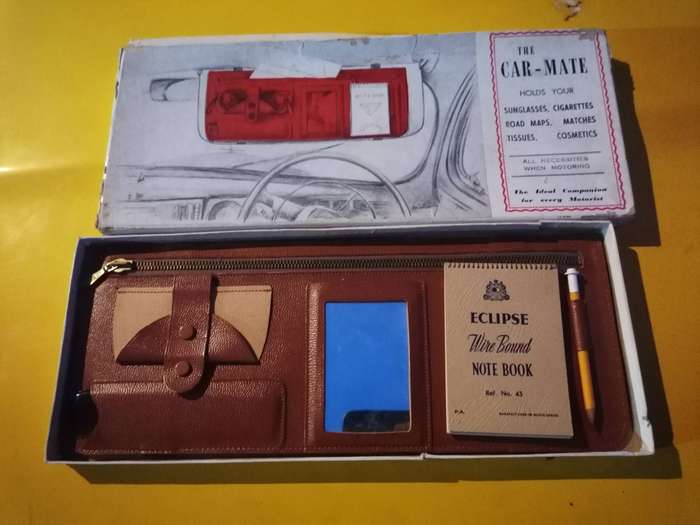 New old stock The Car-Mate" organizer designed to attach to a car's sun visor.