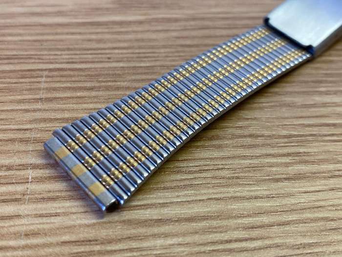 18mm stainless steel bracelet with gold accents