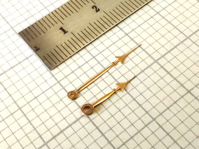 Gilt pocket watch hands