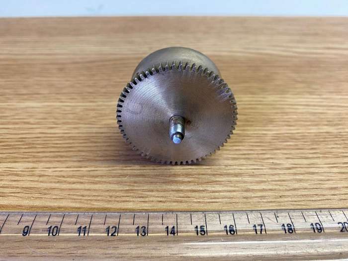 Clock mainspring barrels with spring