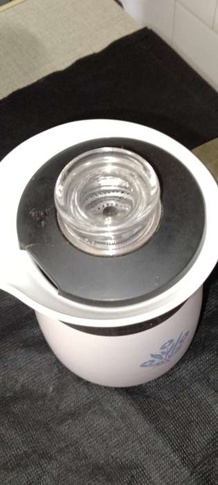 A  corning ware stove top espresso coffee pot