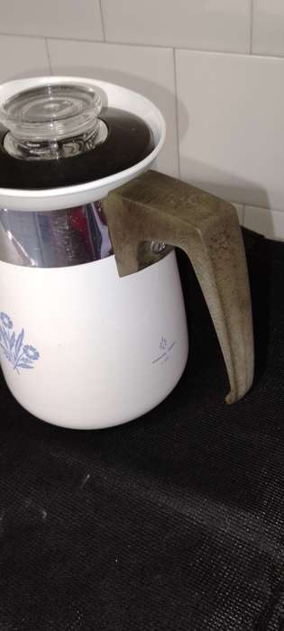 A  corning ware stove top espresso coffee pot