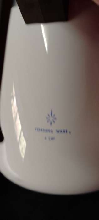 A  corning ware stove top espresso coffee pot