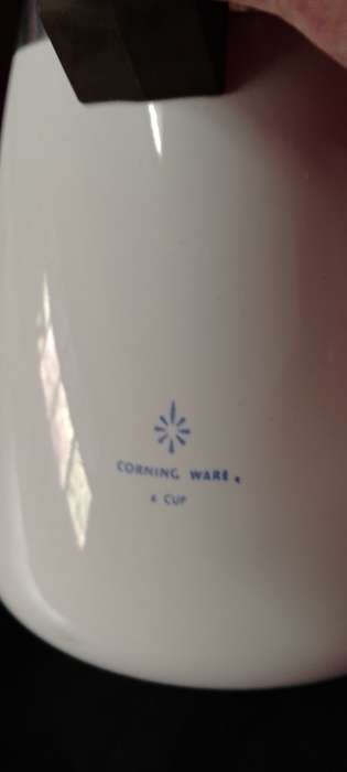 A  corning ware stove top espresso coffee pot