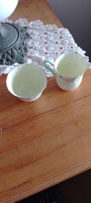 *#A VINTAGE CROWN STAFFORDSHIRE SUGAR AND CREAM SET.