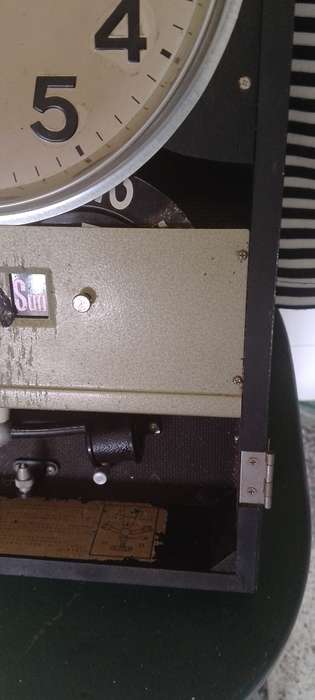 A vintage Seiko wall chiming clock. For parts only. Not working front cover missing.