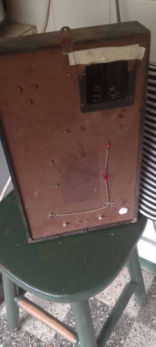 A vintage Seiko wall chiming clock. For parts only. Not working front cover missing.