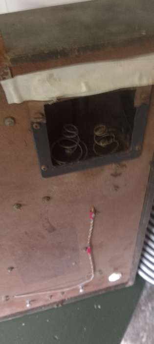 A vintage Seiko wall chiming clock. For parts only. Not working front cover missing.