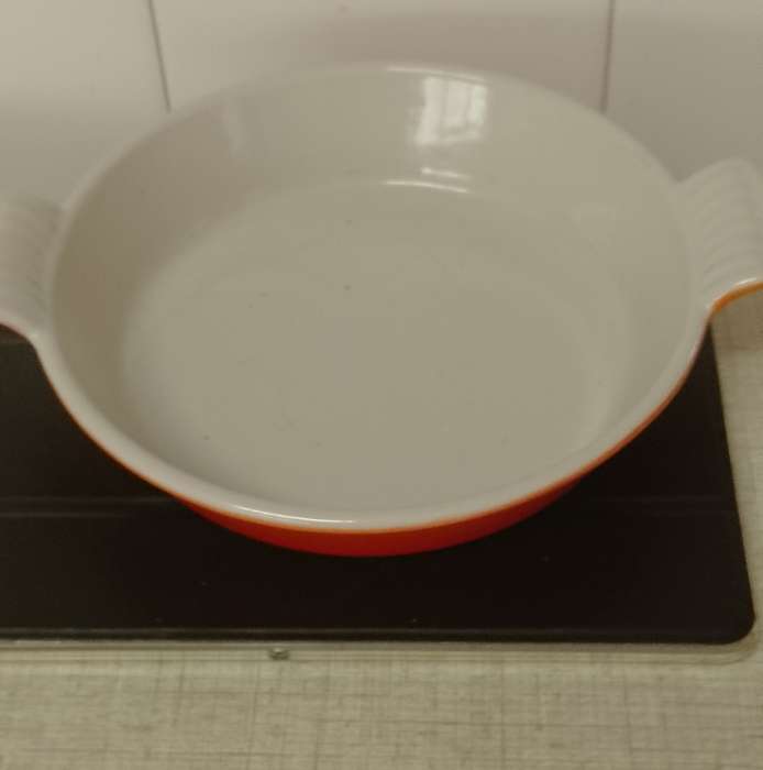 A vintage burnt orange no.18 cast iron enamel Cousances France