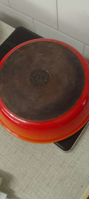 A vintage burnt orange no.18 cast iron enamel Cousances France