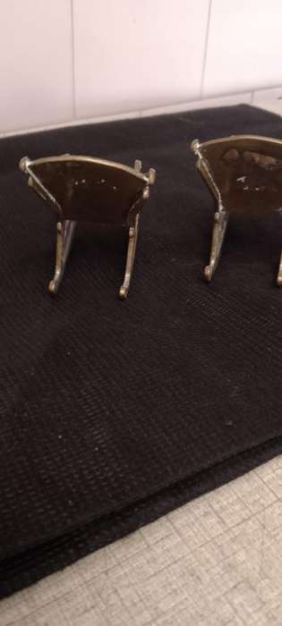 A Pair of antique Brass Chinese Dragon motive miniature rocking chairs.