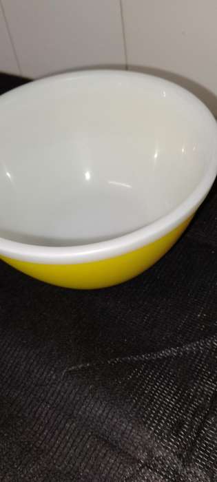 A Vintage yellow JAJ no.702 milk glass mixing bowl.