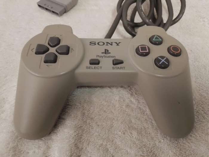 Sony PlayStation 1 Console with Controller and AV Cable