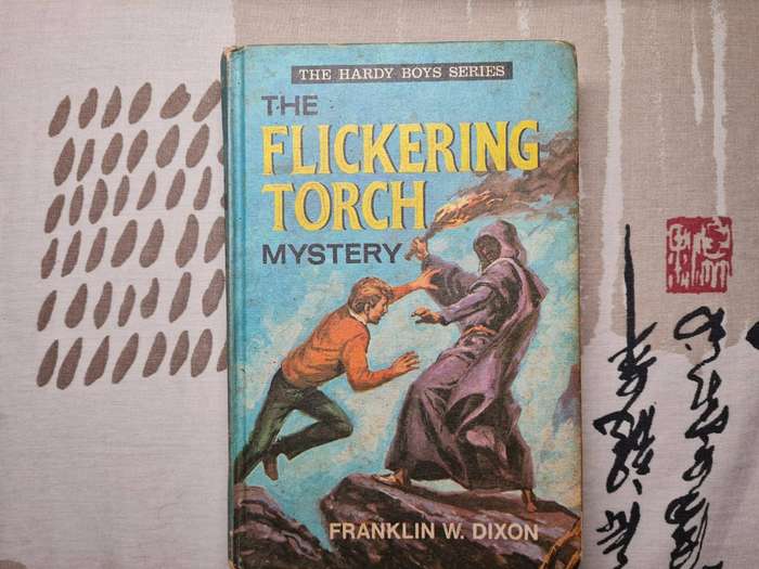 The Flickering Torch Mystery | Franklin W. Dixon (Hardy Boys Hardcover)