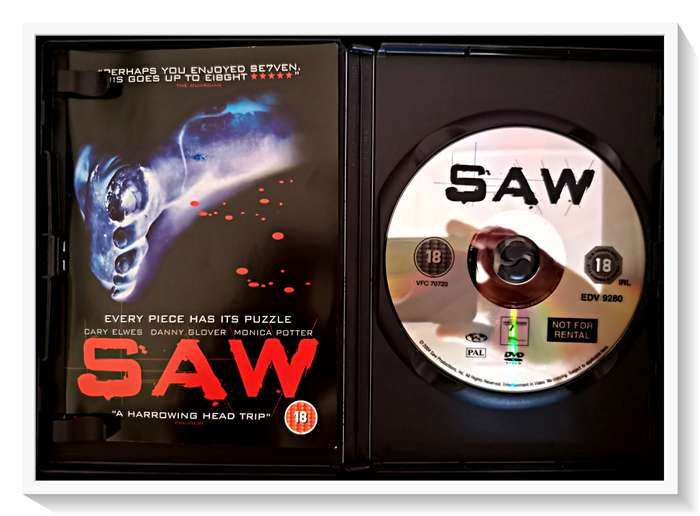 SAW I - THE ORIGNAL CULT CLASSIC - Disc and Casing in A Plus Condition (A+)