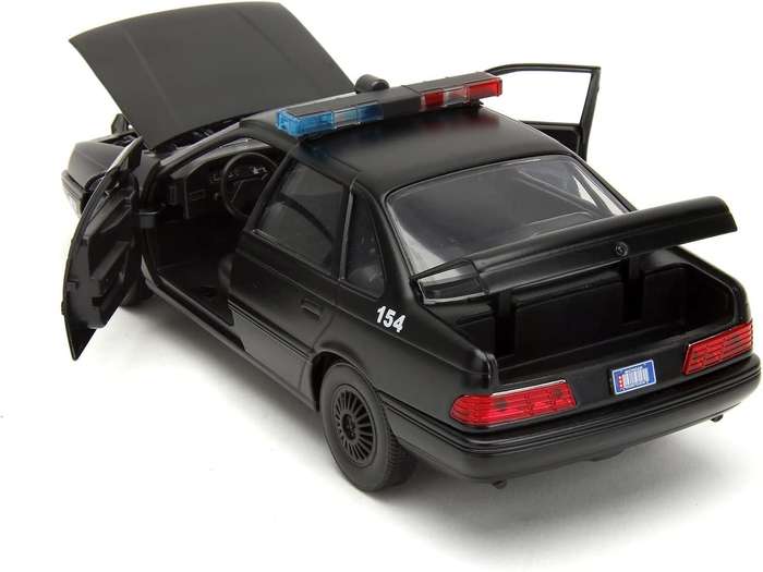 Jada 1:24 die-cast Robocop and OCP Ford Taurus.