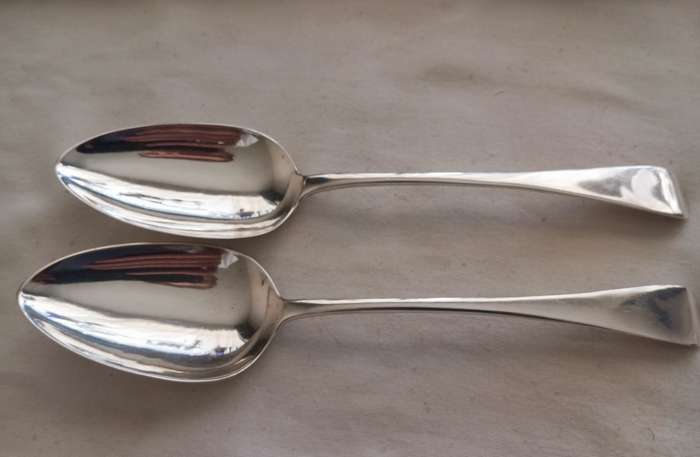 A matching pair of silver Georgian serving spoons