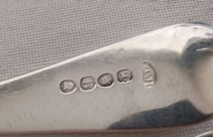 A matching pair of silver Georgian serving spoons