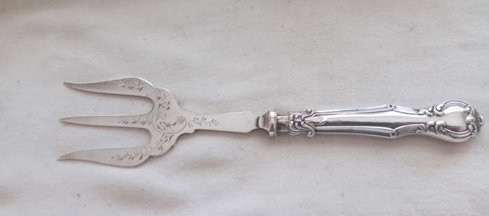 A lovely vintage silver cake fork