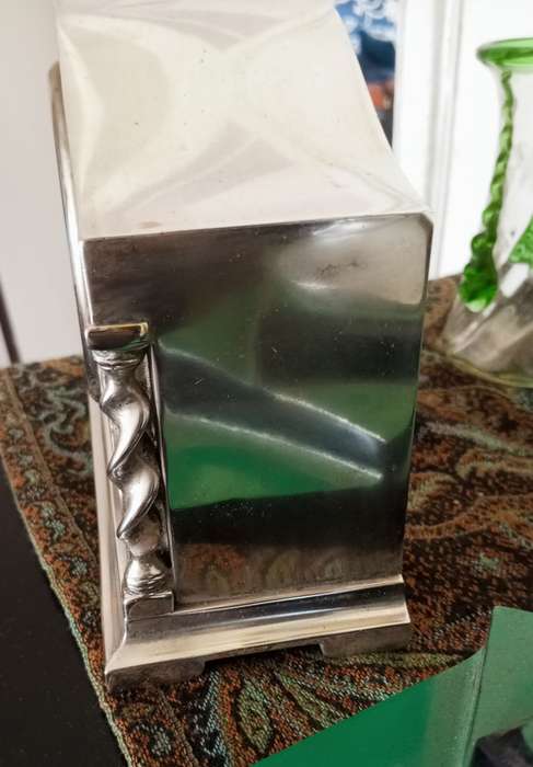 A fine silver plate vintage mantle clock in working order