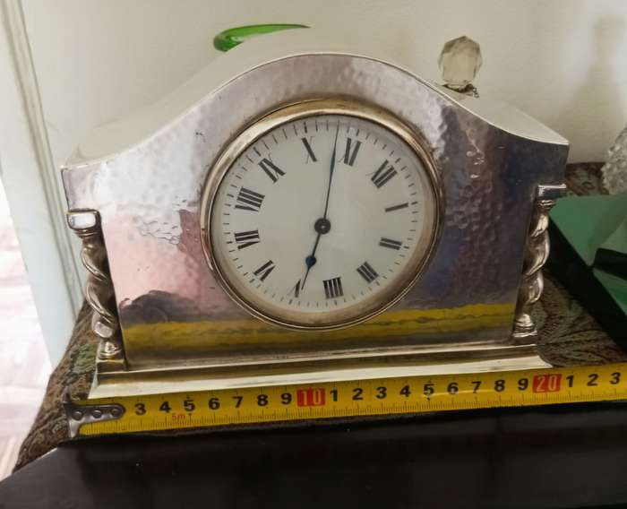 A fine silver plate vintage mantle clock in working order