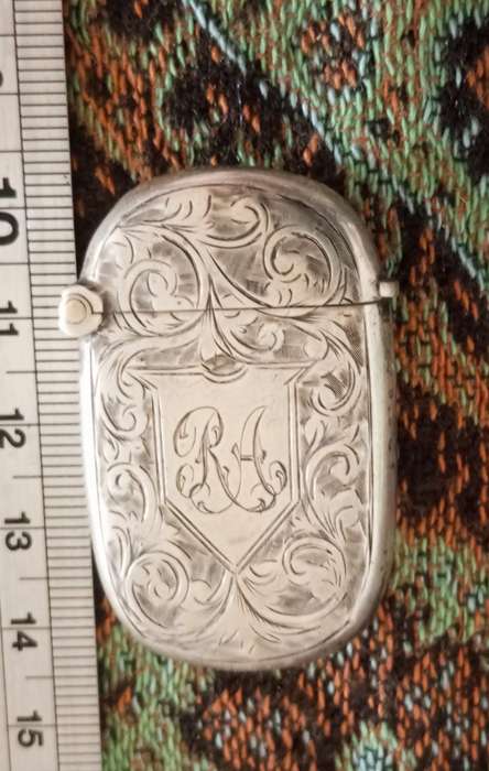 A pigmi sized engraved  silver vesta case 1898