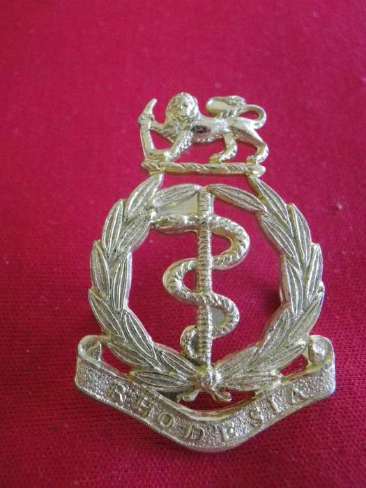 RHODESIAN MEDICAL CORPS  -  GOLD ANODISED CAP BADGE  -                 (102)