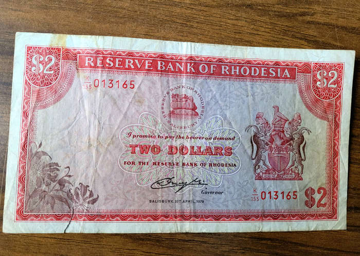 JOB LOT 1979-1994... 5x RHODESIA/ZIMBABWE Bank Notes (Lot). Bid Per Lot) Selling As Pictured...