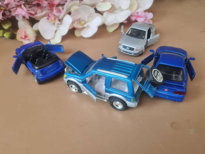 4x PULL-BACK Collector`s Toy Cars: PAJERO SUV 1:43/ HONDA INTEGRA 1:34/AUDI TT 1:32/MINI COOPER 1:32