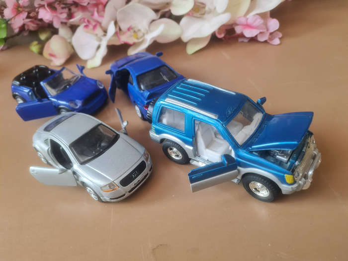 4x PULL-BACK Collector`s Toy Cars: PAJERO SUV 1:43/ HONDA INTEGRA 1:34/AUDI TT 1:32/MINI COOPER 1:32