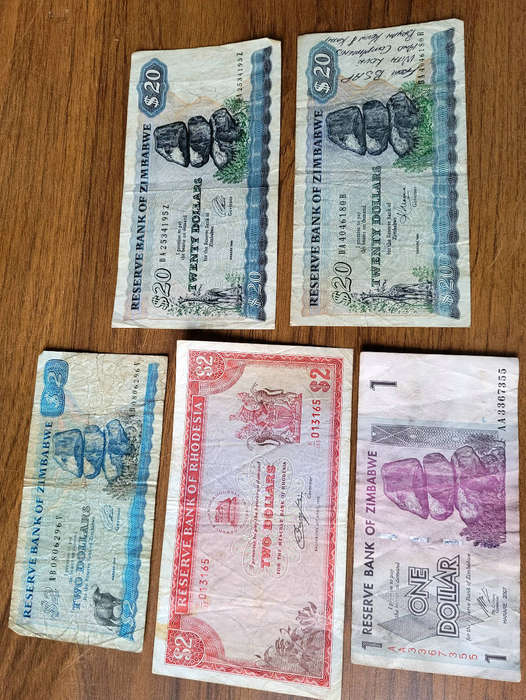 JOB LOT 1979-1994... 5x RHODESIA/ZIMBABWE Bank Notes (Lot). Bid Per Lot) Selling As Pictured...