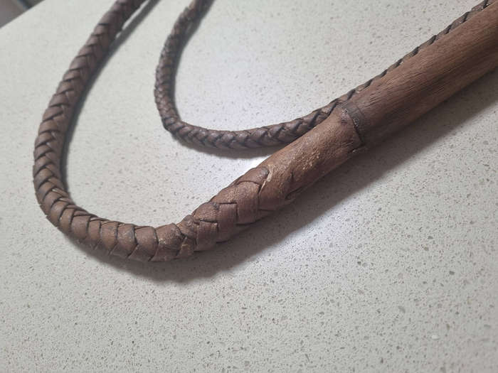 ### Leather with wood handle plaided whip ###
