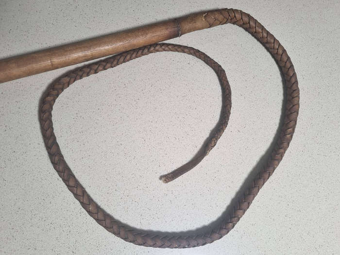 ### Leather with wood handle plaided whip ###