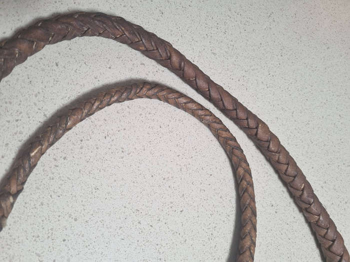 ### Leather with wood handle plaided whip ###