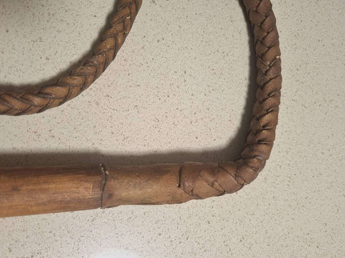### Leather with wood handle plaided whip ###