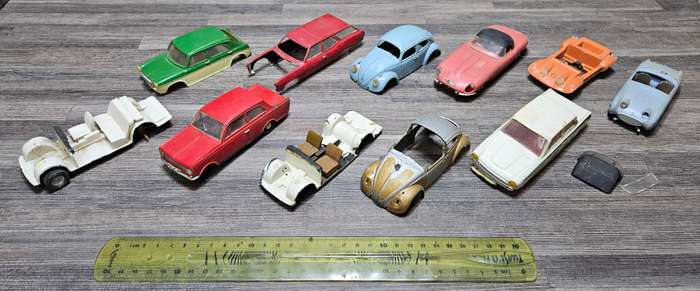 Vintage toy car parts as pictured