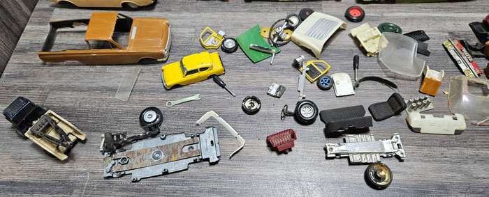 Vintage toy car parts as pictured