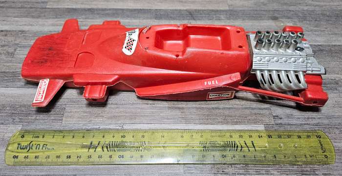 Vintage toy car parts as pictured