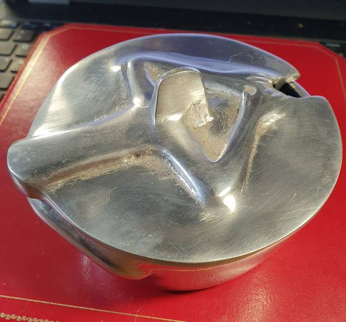 HANNEKE BRAND PEWTER AND STAINLESS SUGAR BOWL. WOMEN HOLDING LID .