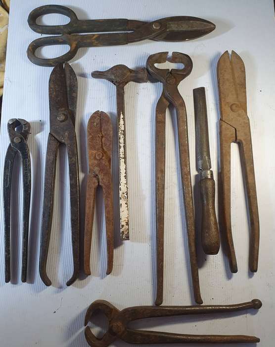9 X ANTIQUE BLACK SMITH TOOLS INCLUDING HUGE STEEL CLIPPER. ONE BID FOR ALL.