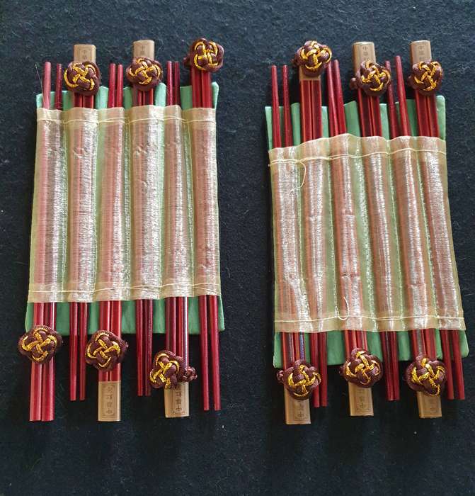 VINTAGE 24 X HIGH END ASIAN TOP QUALITY CHOPSTICKS IN SILK . NEVER BEEN USED.