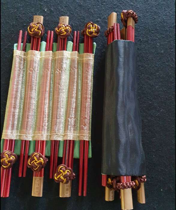 VINTAGE 24 X HIGH END ASIAN TOP QUALITY CHOPSTICKS IN SILK . NEVER BEEN USED.