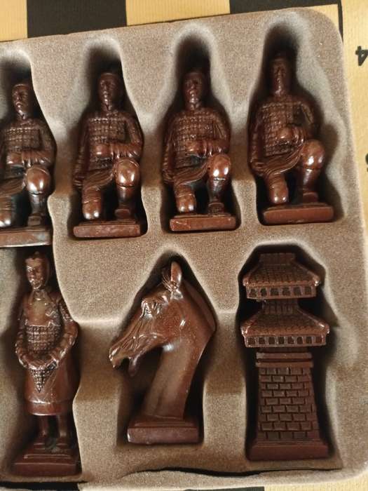 Detailed Oriental Chess Pieces with Fold Up Board