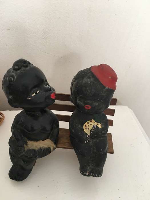 VINTAGE AFRICAN CHILDREN FIGURES ON BENCH  ONE REPAIRD