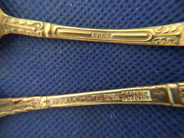 ASSORTMENT OF TEASPOONS AND KNIFE 2 ARE TWELVE APOSTLES