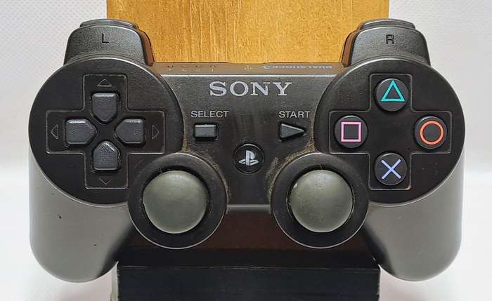 Sony PlayStation 3 Super Slim Console (500GB) with Controllers & Games
